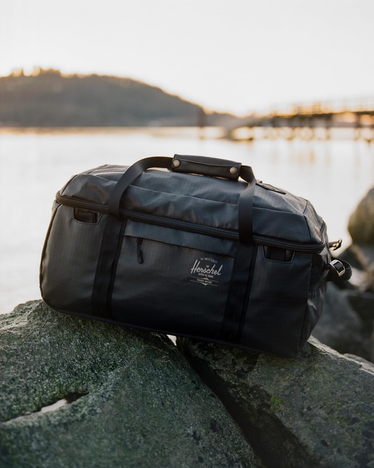 image:imageHerschel Unisex All Season Duffle HeronBlack Standard41LBlack